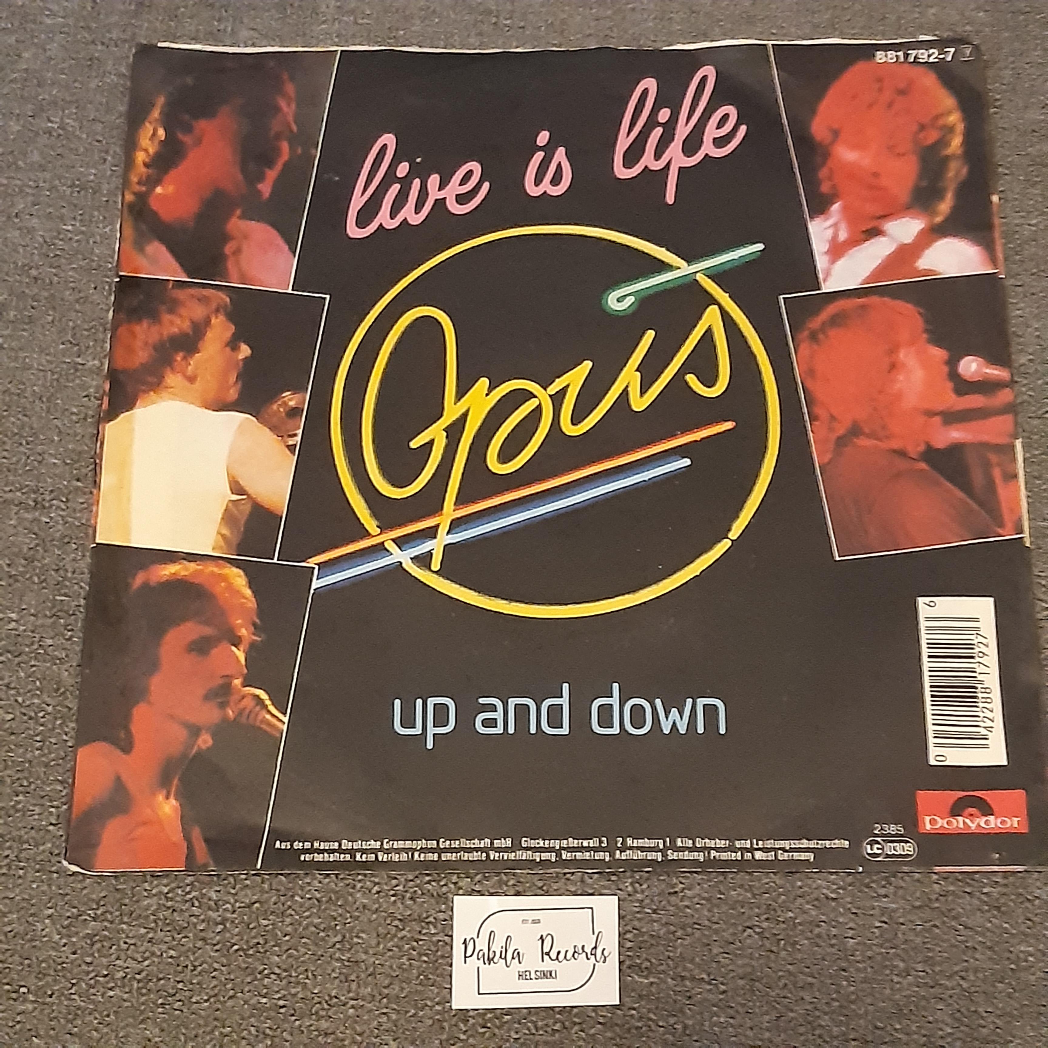 Opus - Live Is Life - Single 7" (käytetty)