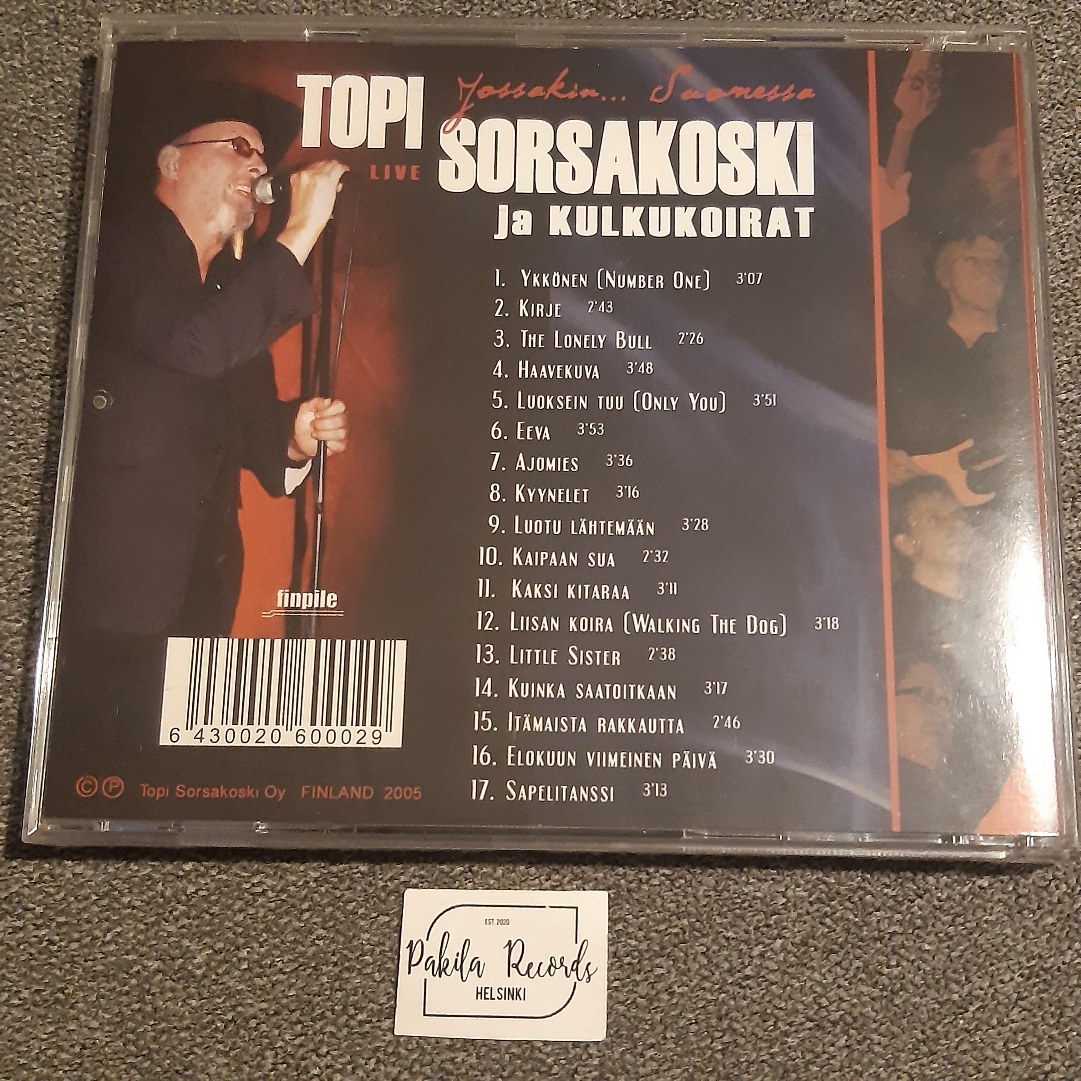 Topi Sorsakoski ja Kulkukoirat - Jossakin... Suomessa Live - CD (käytetty)