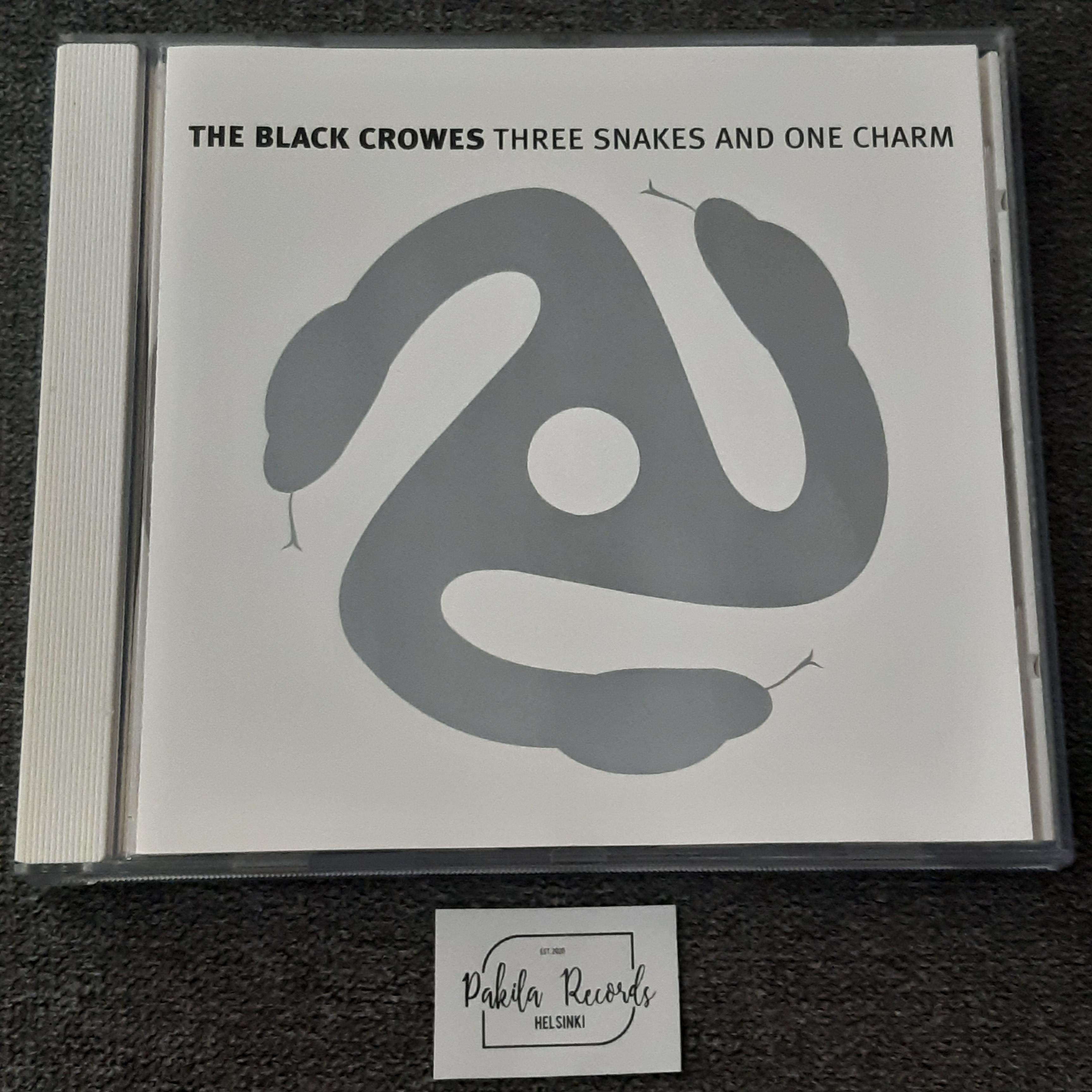 The Black Crowes - Three Snakes And One Charm - CD (käytetty)