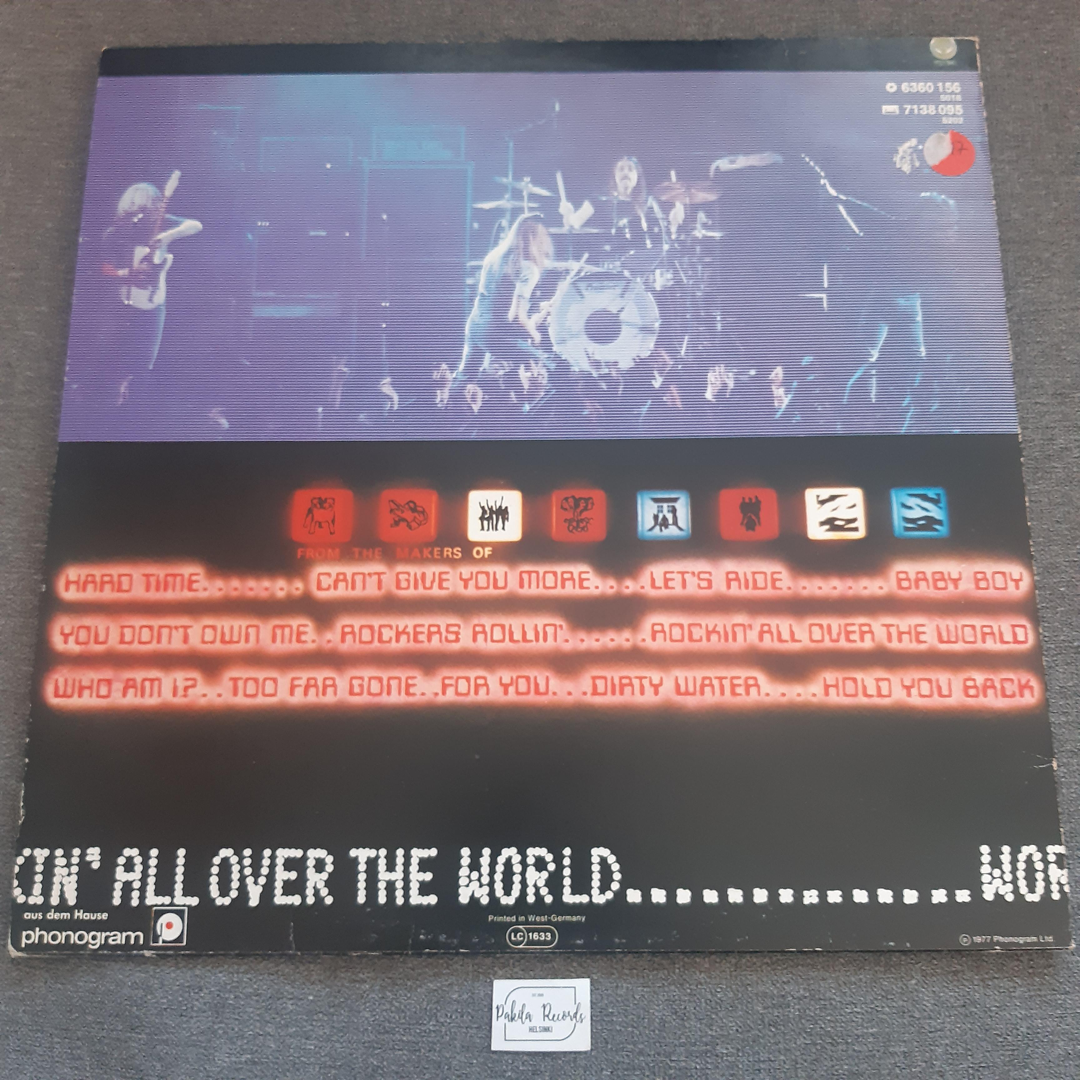 Status Quo - Rockin' All Over The World - LP (käytetty)